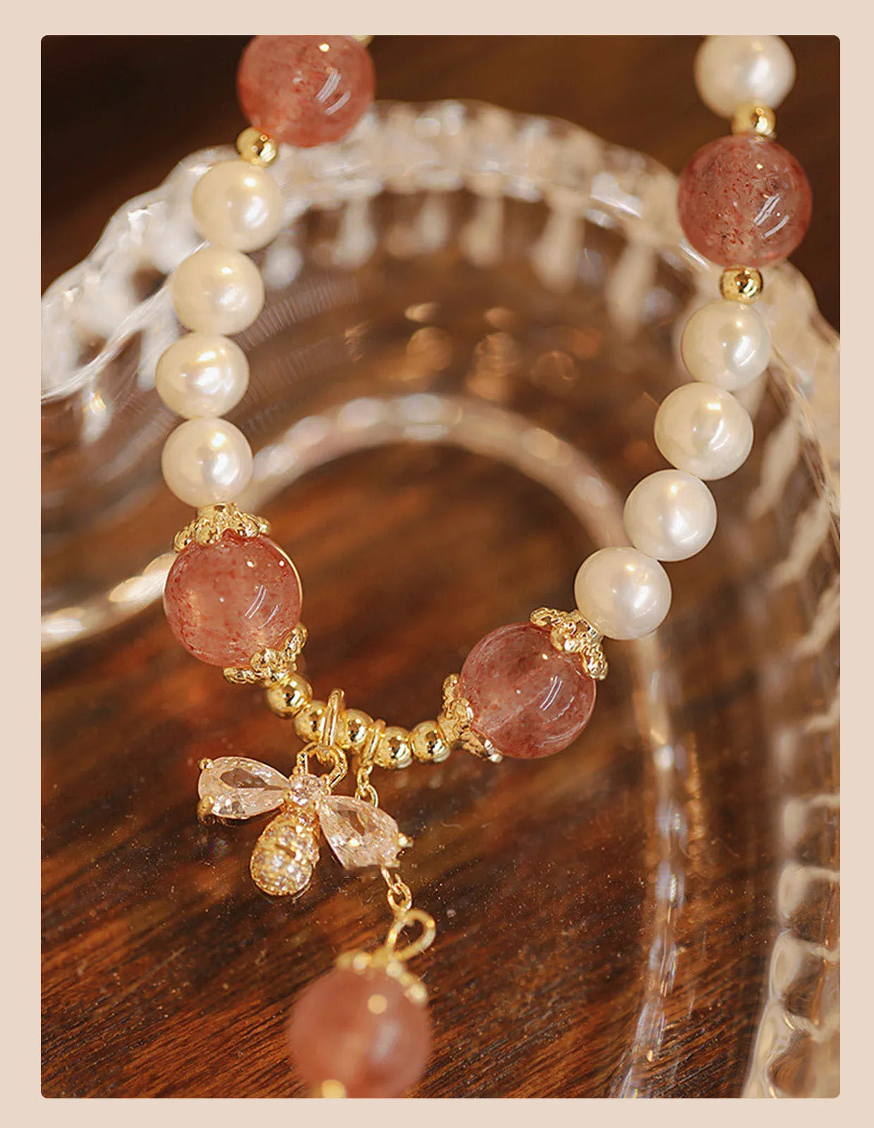 Strawberry quartz crystal bracelet with bow detail and stringed pearls for women
