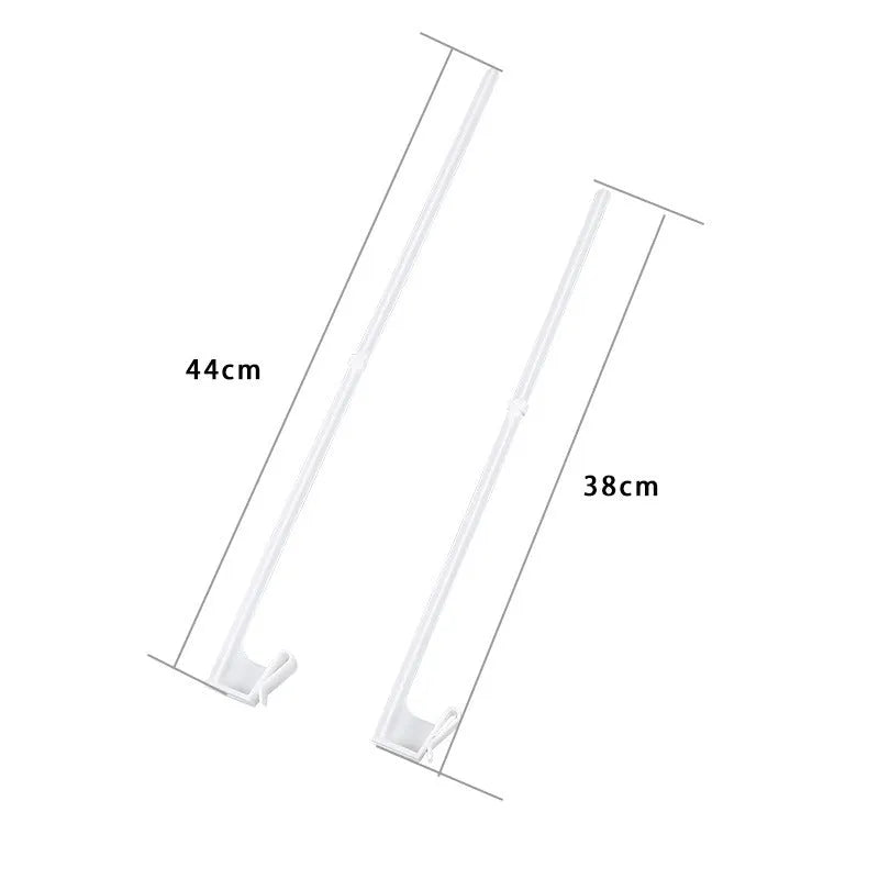 Ten white plastic car window flag pole holder clips on a flat surface.