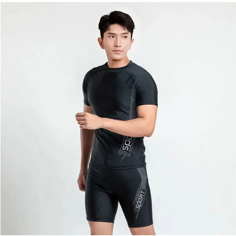Men's patterned two-piece swimsuit set showing top and trousers on a size chart background.