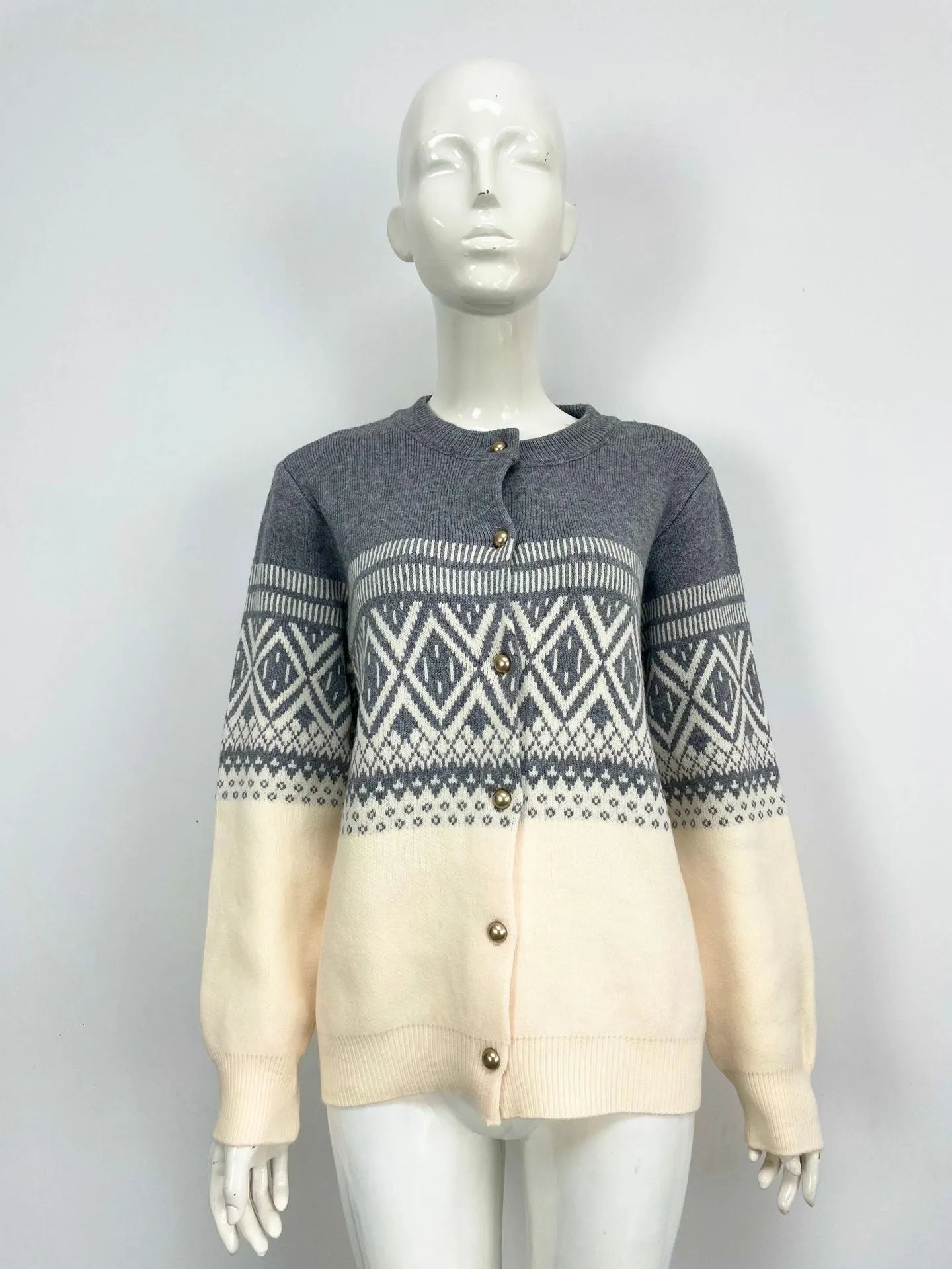 Women's red alpaca wool cardigan with grey diamond knit pattern and long sleeves