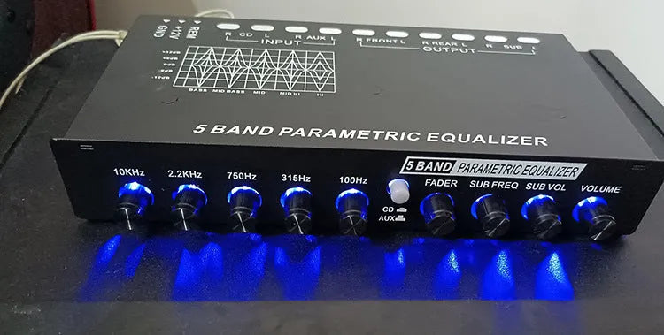 Black car audio EQ equaliser unit with control panel for frequency adjustment and subwoofer management