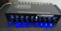 Black car audio EQ equaliser unit with control panel for frequency adjustment and subwoofer management