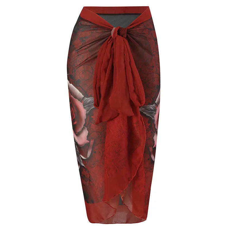 Women's blue printed one-piece swimsuit with matching gauze skirt, a holiday outfit set for swimming.