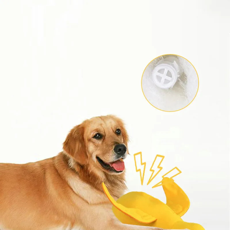 Yellow teddy dog toy with integrated duck doll, a pet training aid with sound and treat dispenser.
