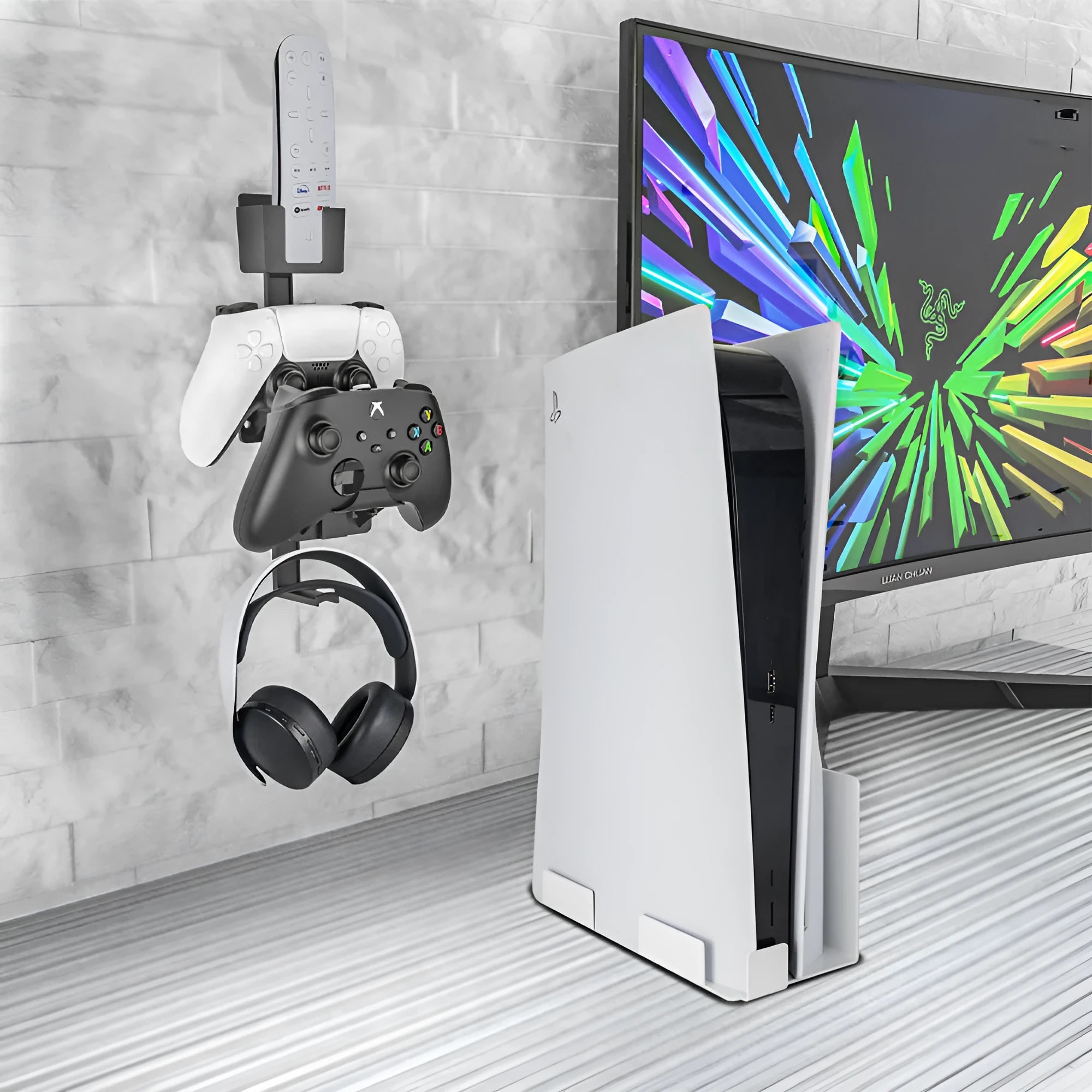White wall-mounted storage hook holding a PS5 controller and a gaming headset.