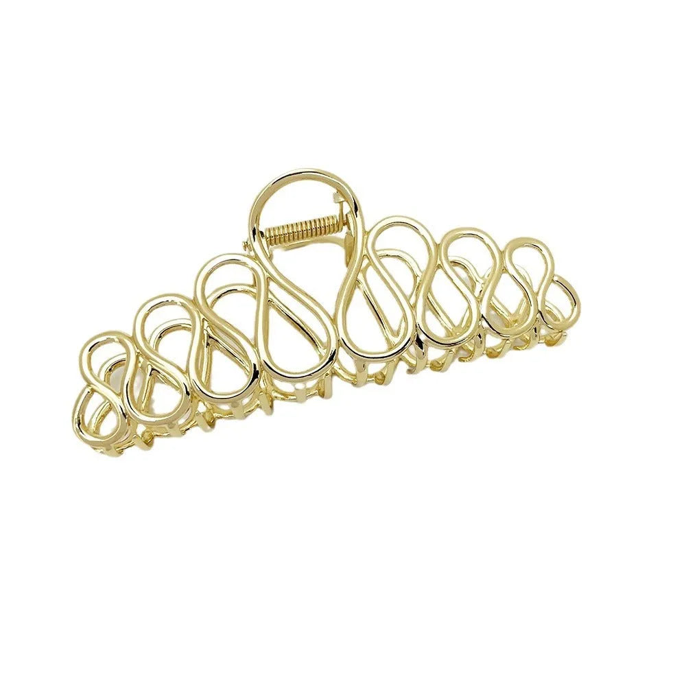 Large minimalist updo hair clip in gold or silver electroplated alloy with tassel details