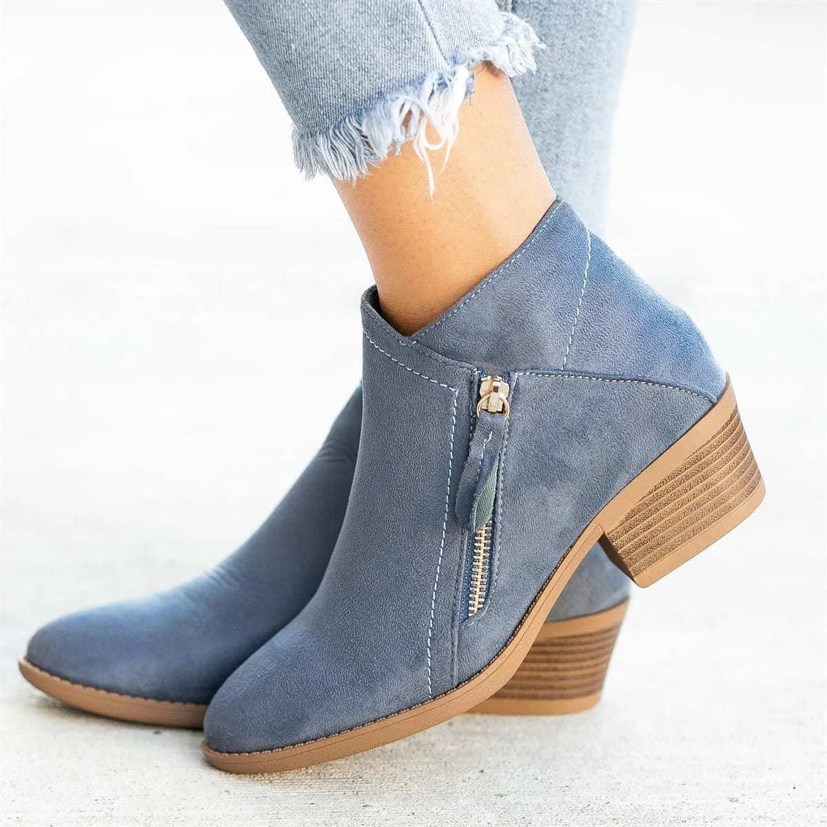 Women's blue suede Dr Martens-style ankle boots with chunky heel and side zip