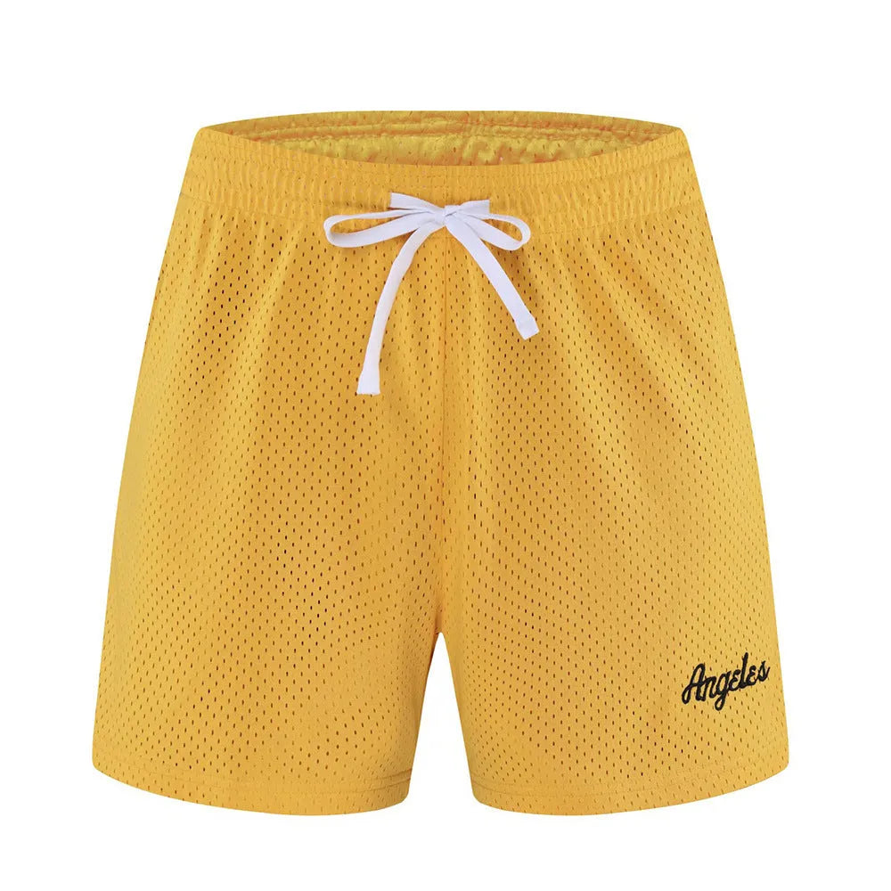Men's black double-layer mesh shorts for summer sports and leisure wear.