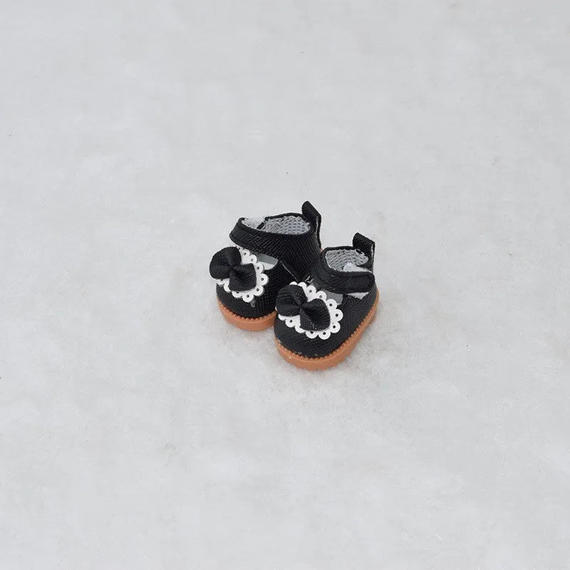 Set of miniature doll replacement shoes in various styles and colours for 17cm scale figures.