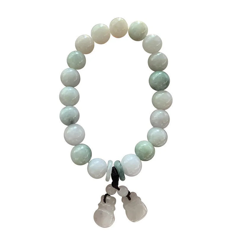 Emerald green jade bracelet with hanging symbolic charms including Maitreya Buddha design