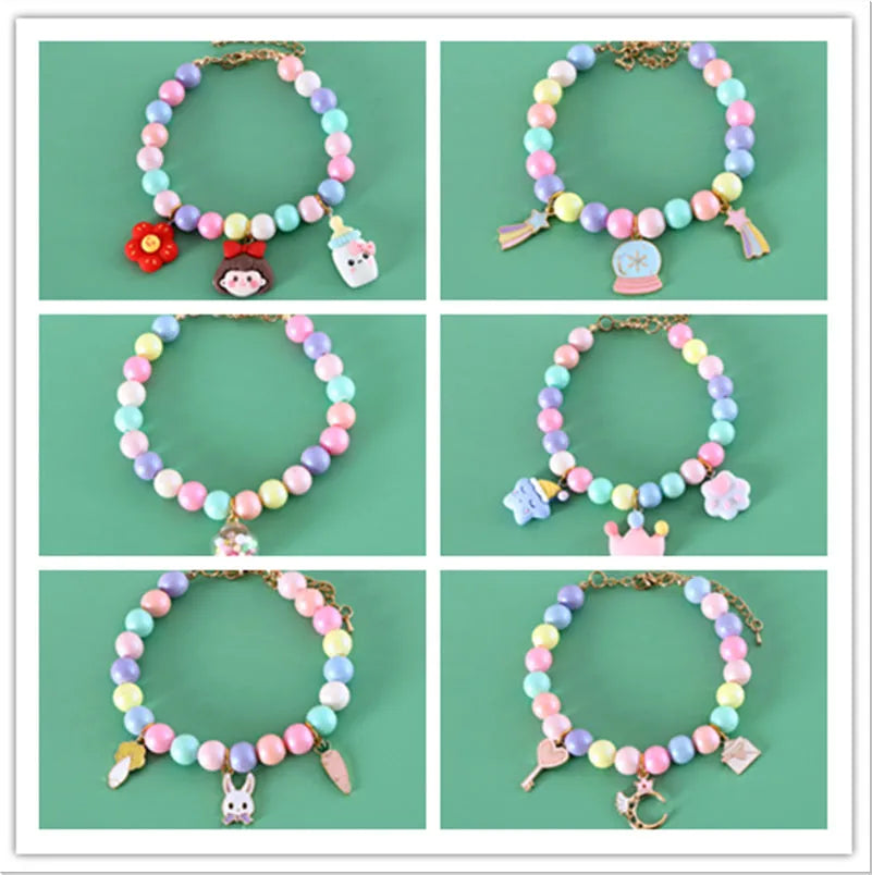 Colourful resin pet jewellery with moon and meteor motifs in macaron colours for dogs and cats