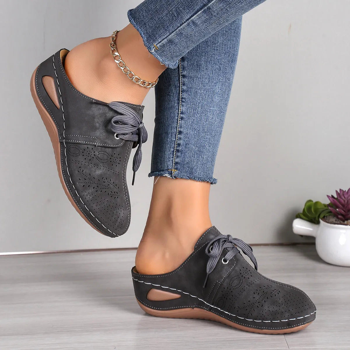Women's baotou lace-up slippers in light grey with a hollow-out wedge and rubber sole.