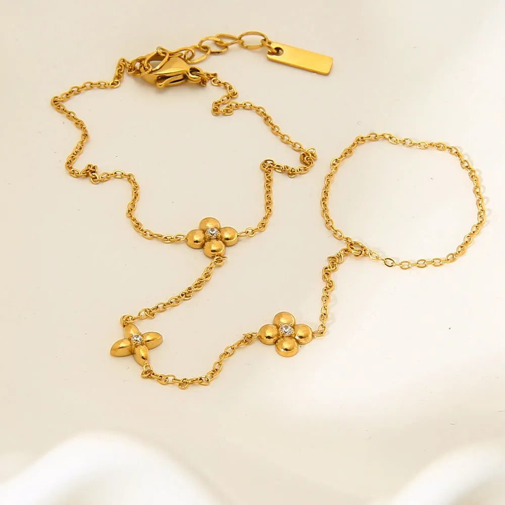 Women's gold colour stainless steel bracelet with eight-pointed stars and flower geometric design