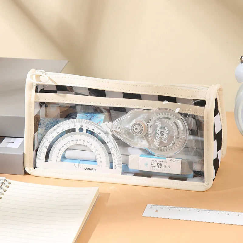Transparent PVC pencil case with chessboard pattern showing pens inside, 21.5 cm length