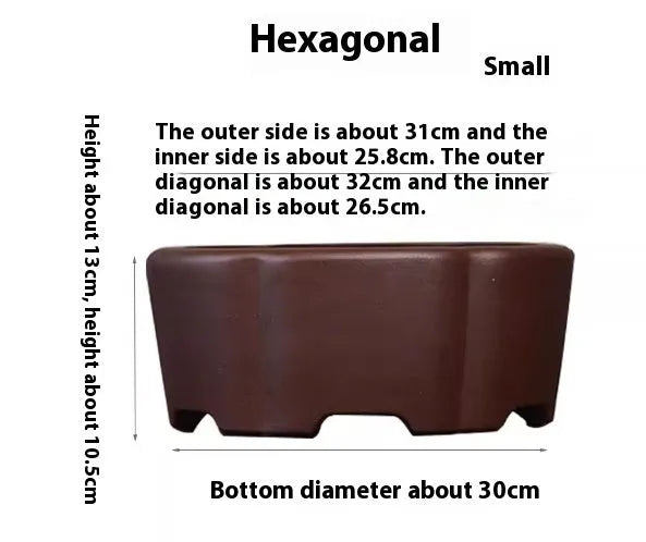 A square purple clay flower pot for succulents or bonsai plants on a tabletop.