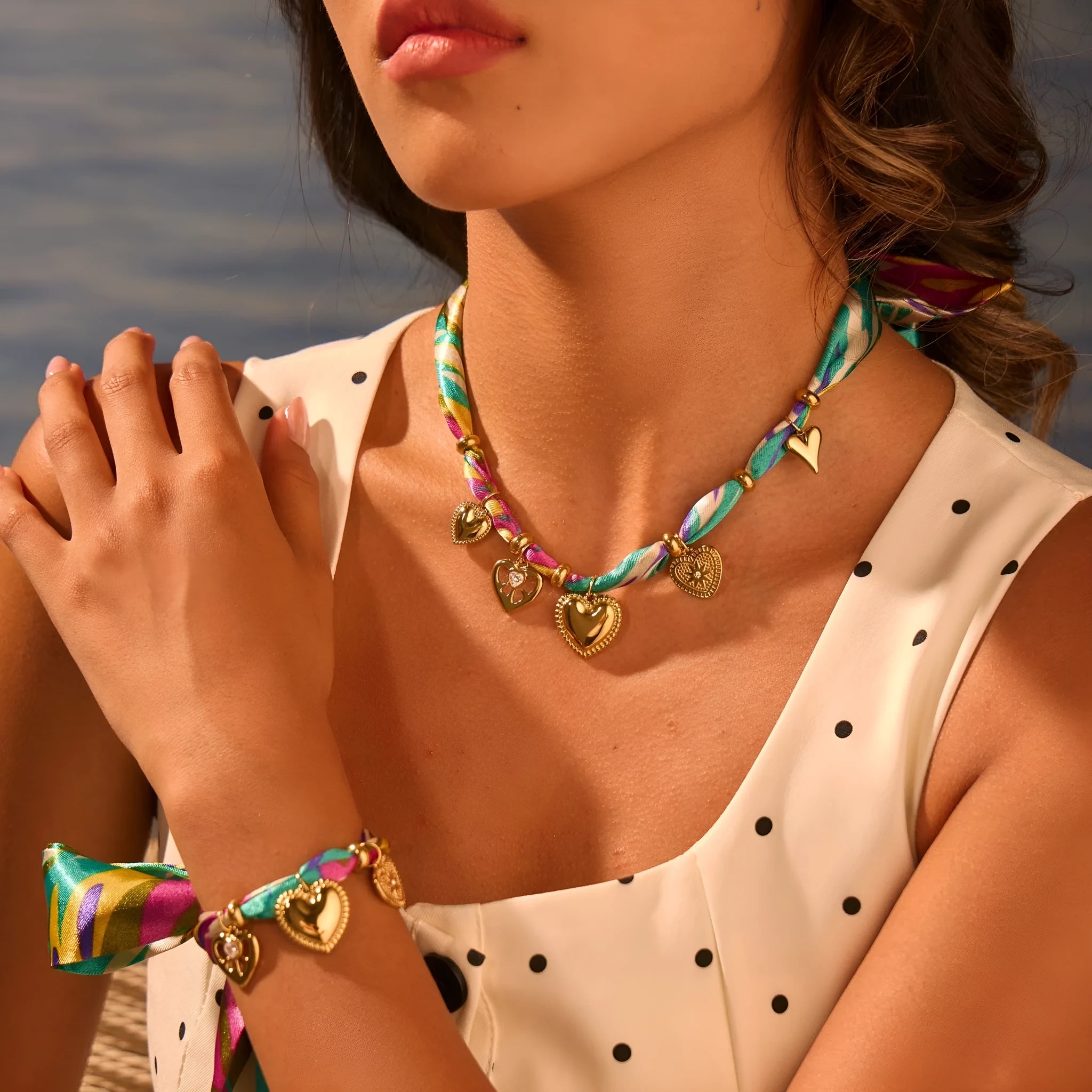 Women's stainless steel necklace and bracelet set with 18K gold plating and geometric pendant