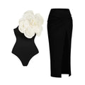 Women's one-piece swimsuit with three-dimensional floral pattern in black and blue colour options.
