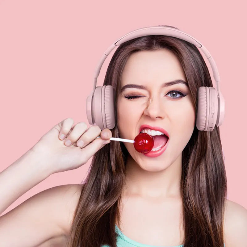 Wireless children's headphones with RGB LED lights in bunny pink colour with stereo sound and microphone