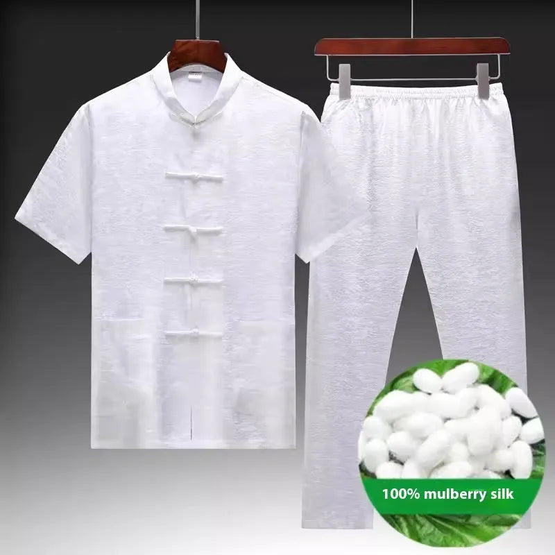 Men's traditional Chinese-style Tang suit made from mulberry silk satin in light green, navy, or white.