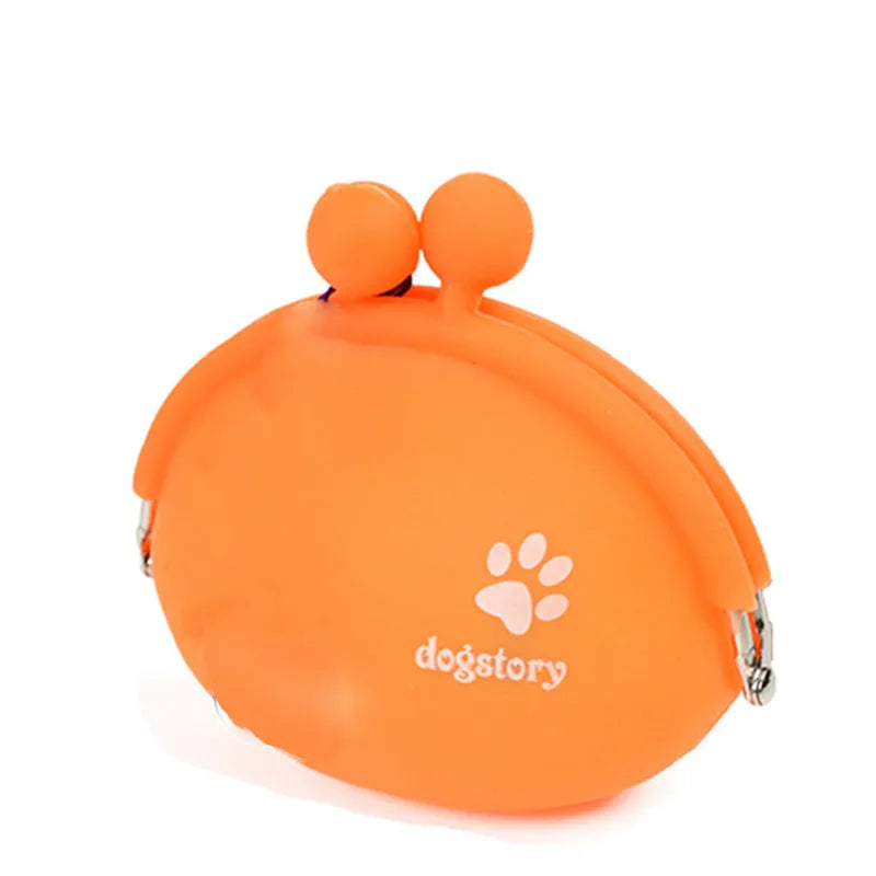 Yellow silicone dog treat pouch attached to waist belt for hands-free training