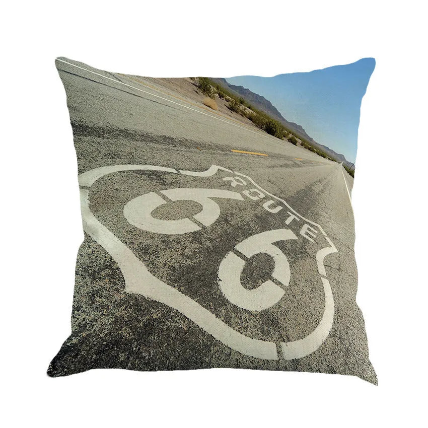 Square linen cushion cover with Route 66 landscape pattern, shown in one of six available colours.