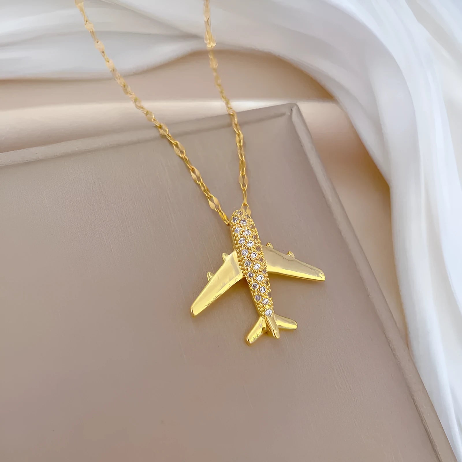Gold geometric copper pendant necklace on adjustable stainless steel chain