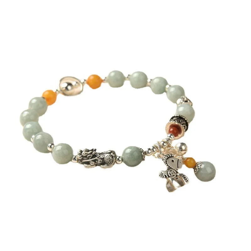 A vintage-style natural jade and alloy metal bracelet bangle for adults, showing retro pony style design.