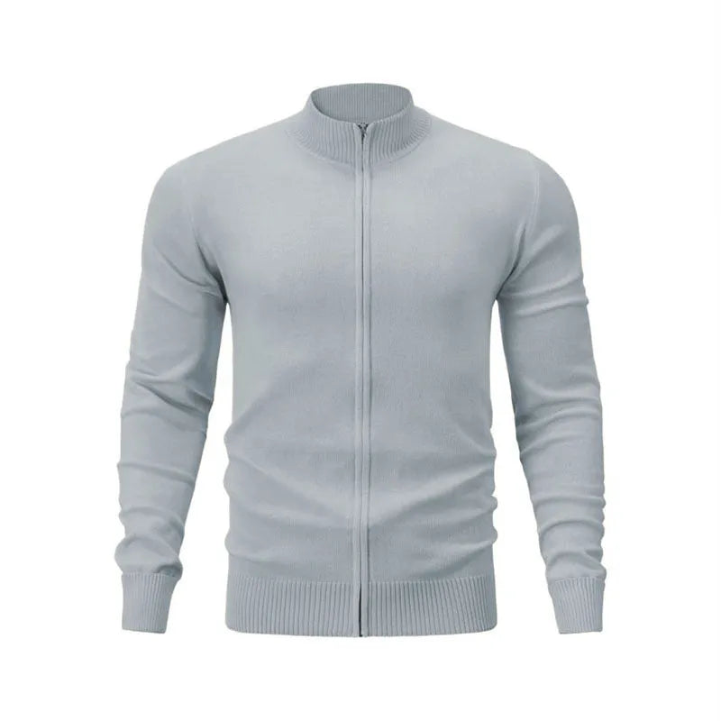 Man wearing a stand collar zip-front casual sweater in a solid colour, showing loose fit and front zipper detail.