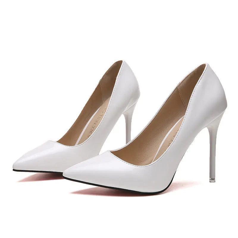 Women's pointed-toe stiletto heel pumps in apricot colour with a super high heel.