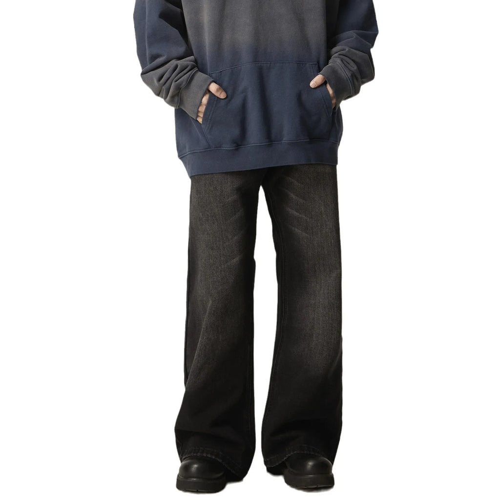 Black loose straight cut retro jeans with zipper fly on mannequin showing full silhouette