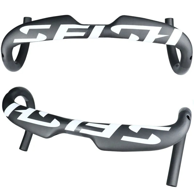 Carbon fibre road bicycle handlebar showing 31.8mm clamp area and curved drops