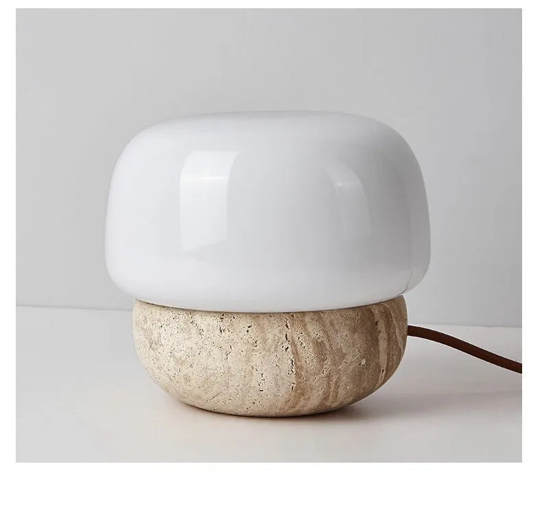 Cream coloured retro bedside lamp measuring 18x17cm with button switch and warm bulb illumination