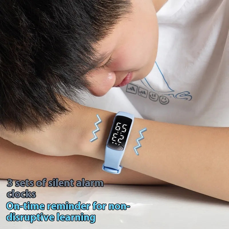 Vibration alarm waterproof electronic watch with coloured silicone strap and LED display.