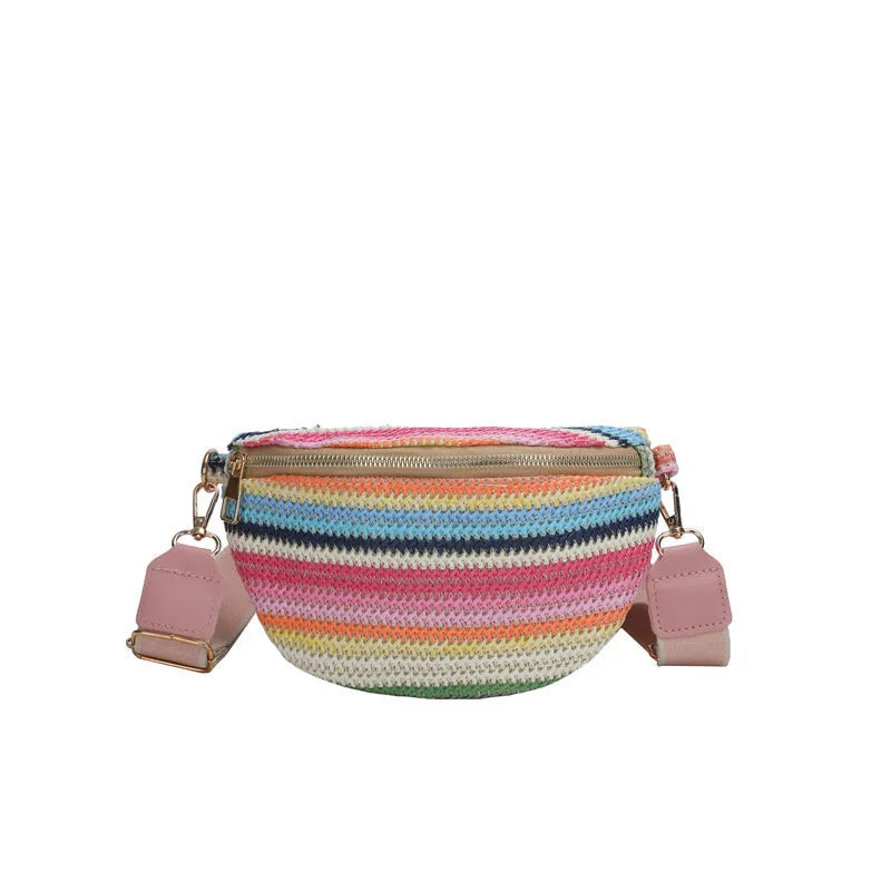 Women's woven straw beach bag in bohemian style, available in pink or blue colour with single shoulder strap