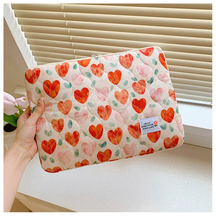 Floral print laptop bag for women in green flower pattern showing storage compartments and slim profile