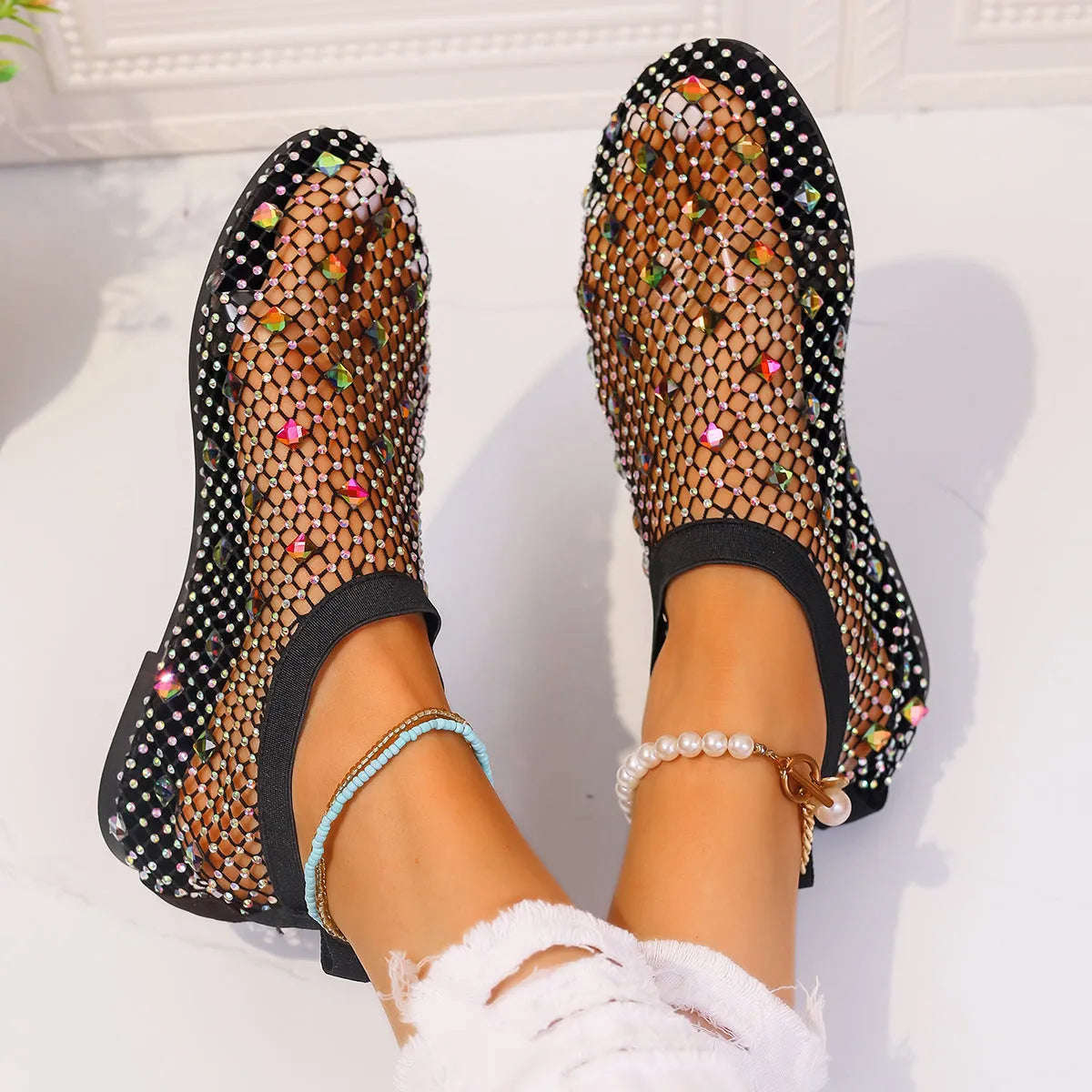 Women's flat sandals with mesh upper, colourful rhinestone design, and round toe