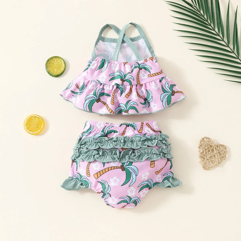 White two-piece girls swimsuit set with short sleeve top and shorts on a hanger