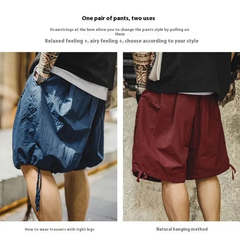 Prussian Blue men's loose fit beach shorts with embroidered designs