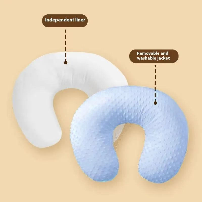 Nursing pillow with integrated spill barrier in a choice of pink, yellow, grey, or light blue colours.