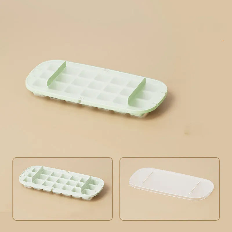 Colourful ice cube tray with grid design and integrated ice shovel storage compartment