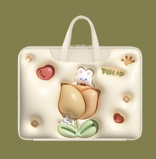 PU leather inflatable laptop bag with cartoon design, shown hanging from a suitcase handle.