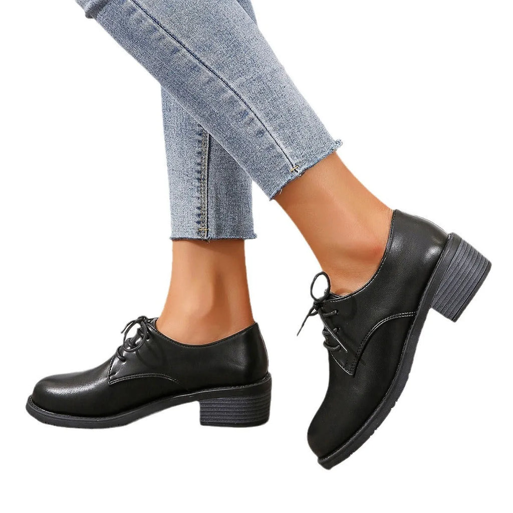 Black women's work shoes with chunky heel and soft rubber sole