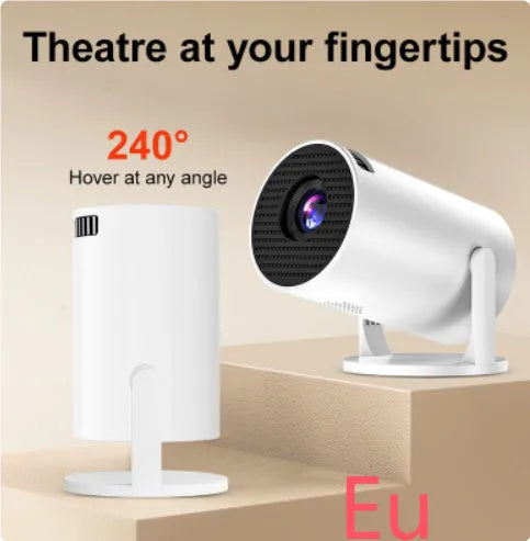 White mini wireless portable HD projector for home cinema use on a wooden table