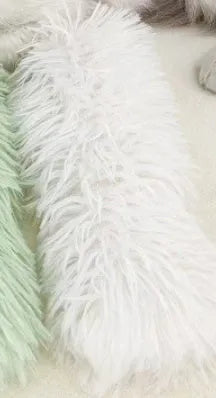 Plush cat toy pillow in blue, green, pink, or white colours measuring 27 by 10 centimetres