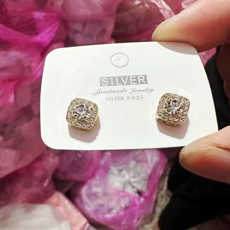 Square diamond geometric earrings in silver and gold colours with quadrilateral design