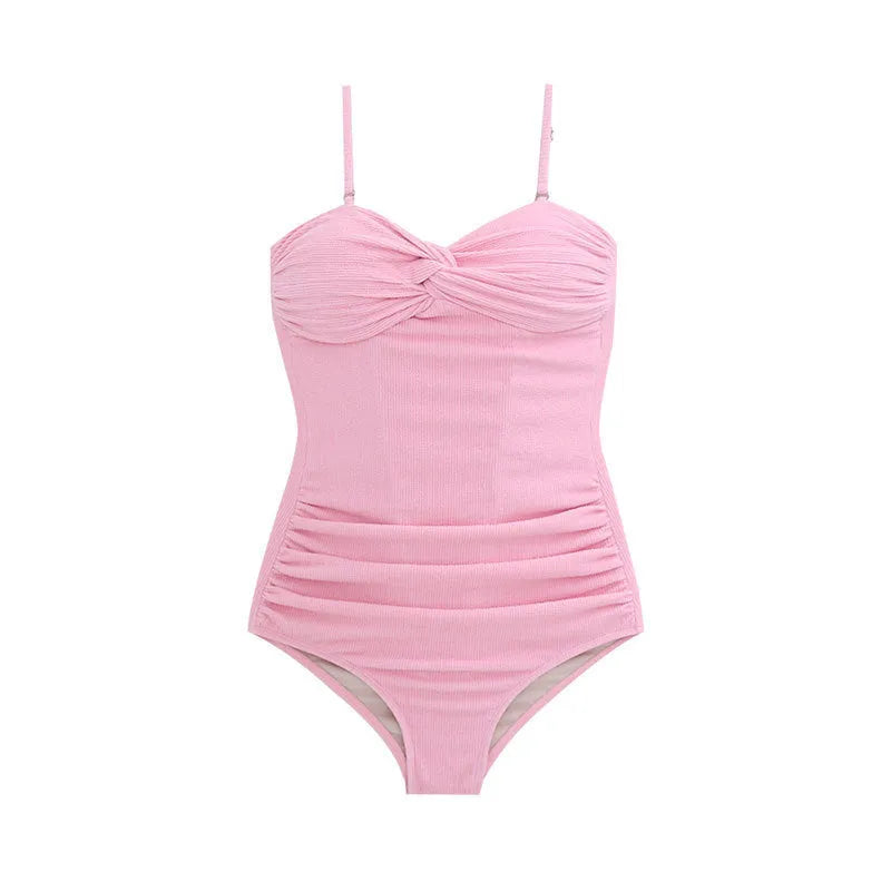 Women's black one-piece suspender swimsuit with high waist and adjustable straps