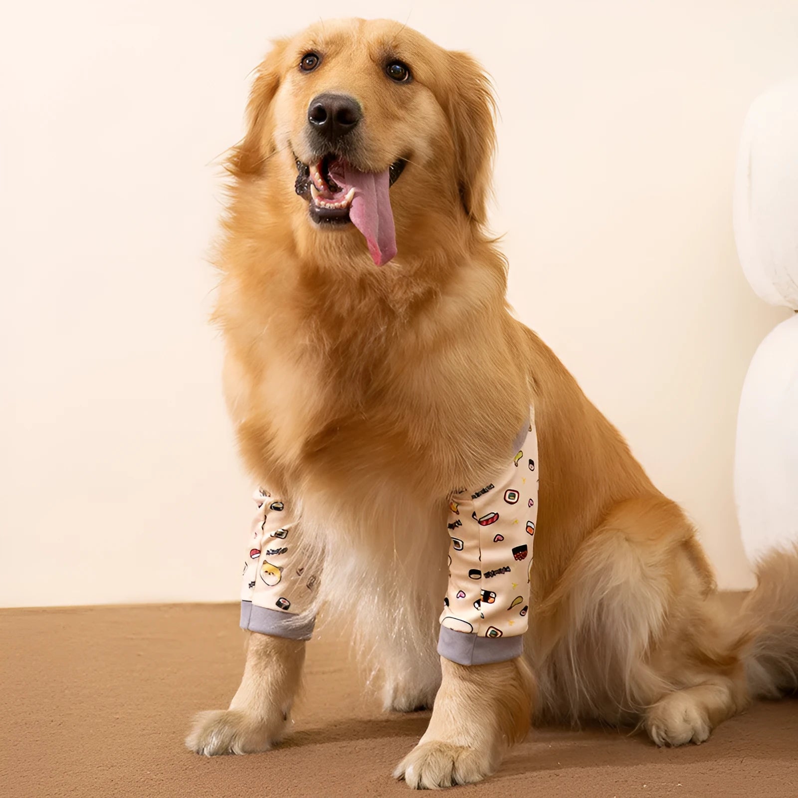 Blue dog knee protector pad with thick elbow padding and adjustable strap, shown with a matching scarf.