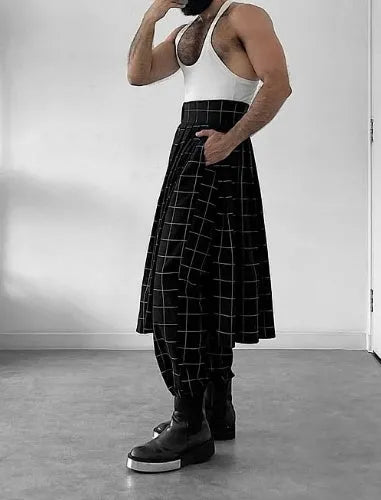 Men's plaid check trousers with apron front panel showing elastic waist and button fly