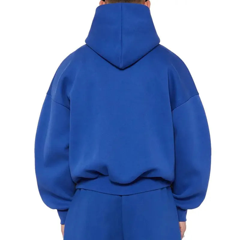 A man's grey fleece-lined cotton pullover hoodie on a hanger.