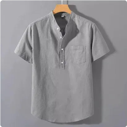 Men's beige casual short sleeve linen shirt with a stand collar and loose fit on a hanger.